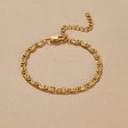 Gold Swirl Link Chain Bracelet