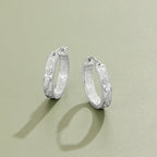 Silver Sculpted Flower Hoop Earrings